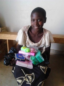 Girls receiving provisions for school