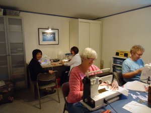Volunteers sewing sanitary protection